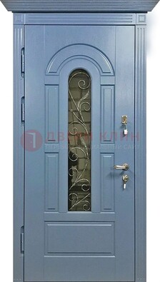 Железная дверь со стеклом и ковкой для коттеджа ДСК-128 в Воскресенске
