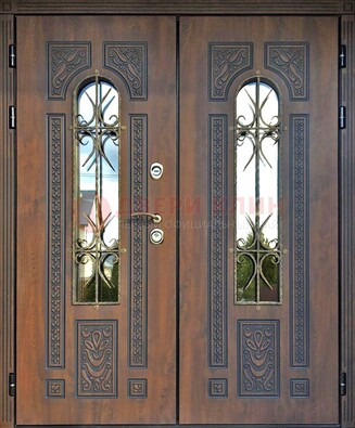 Двухстворчатая стальная дверь со стеклом и ковкой для дома ДСК-153 в Чехове