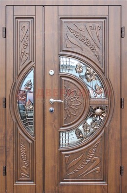 Уличная дверь в цвете Итальянский орех с виноритом и ковкой со стеклом ДВТ-147 в Чехове