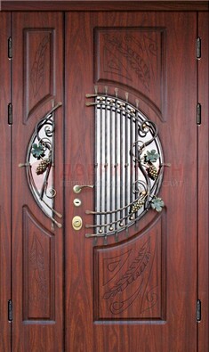 Железная дверь с виноритом и стеклом с ковкой ДВТ-170 в Чехове